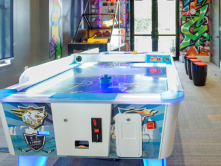 air hockey in teen game room