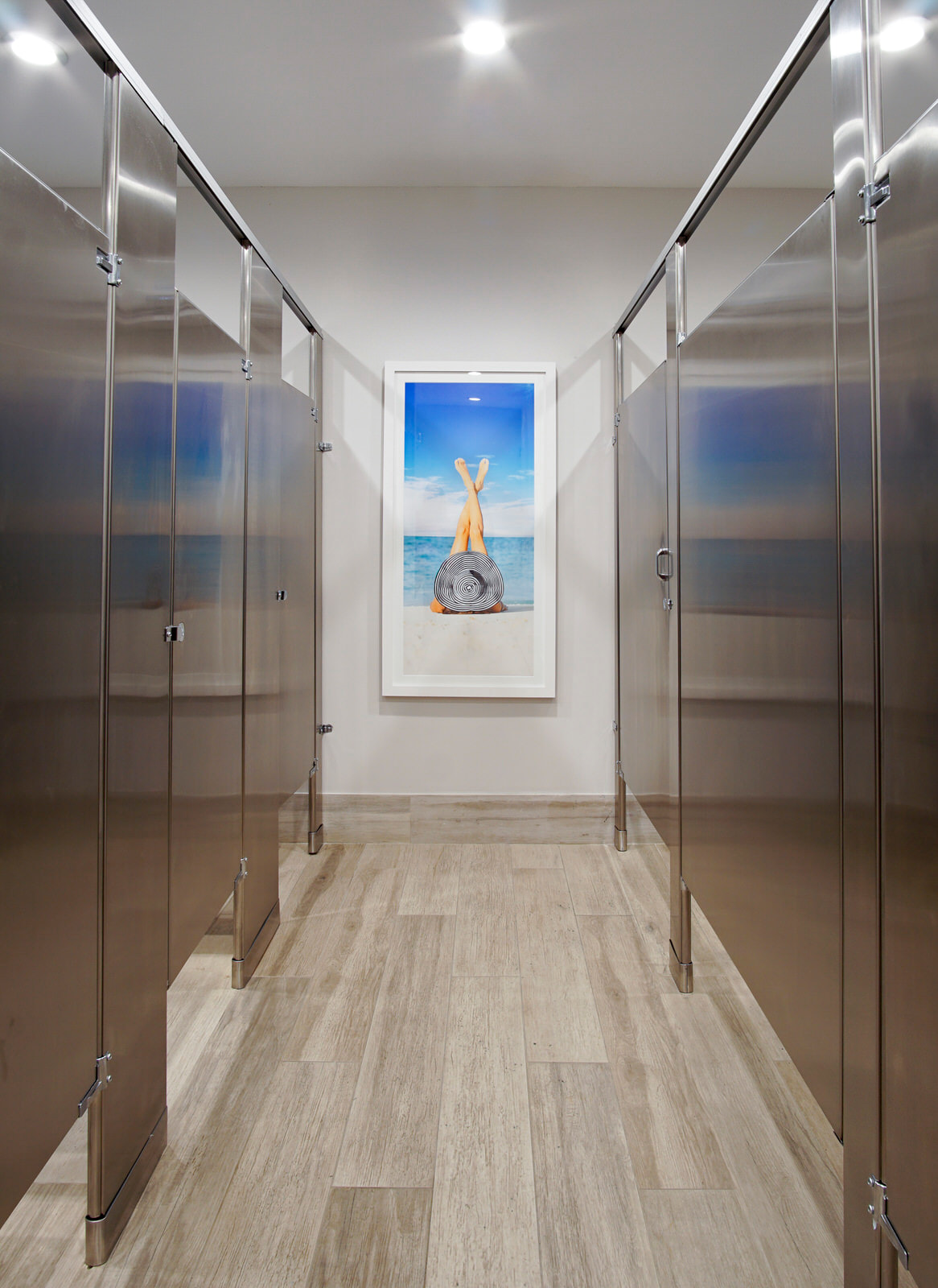 commercial bathroom with artwork