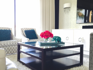 dark wood coffee table surrounded by white