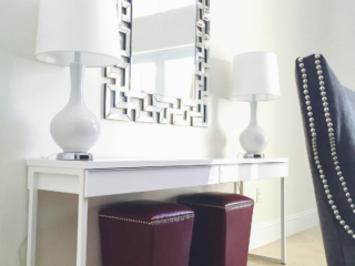 hall way decor with intricate mirror