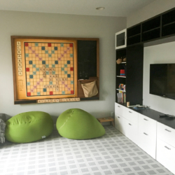 kids space with large scrabble mounted to the wall