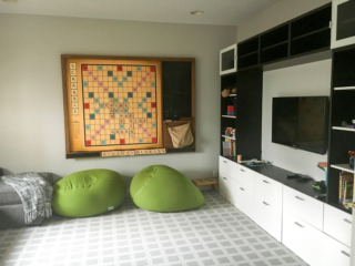 kids space with large scrabble mounted to the wall