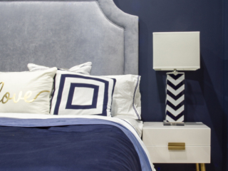 navy blue and gold with patterns bedroom