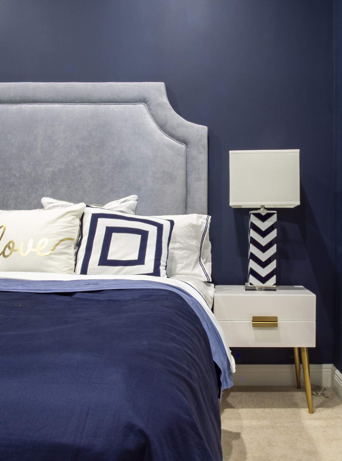 navy blue and gold with patterns bedroom