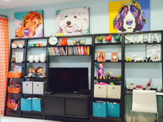 orange and teal kids space with wall unit