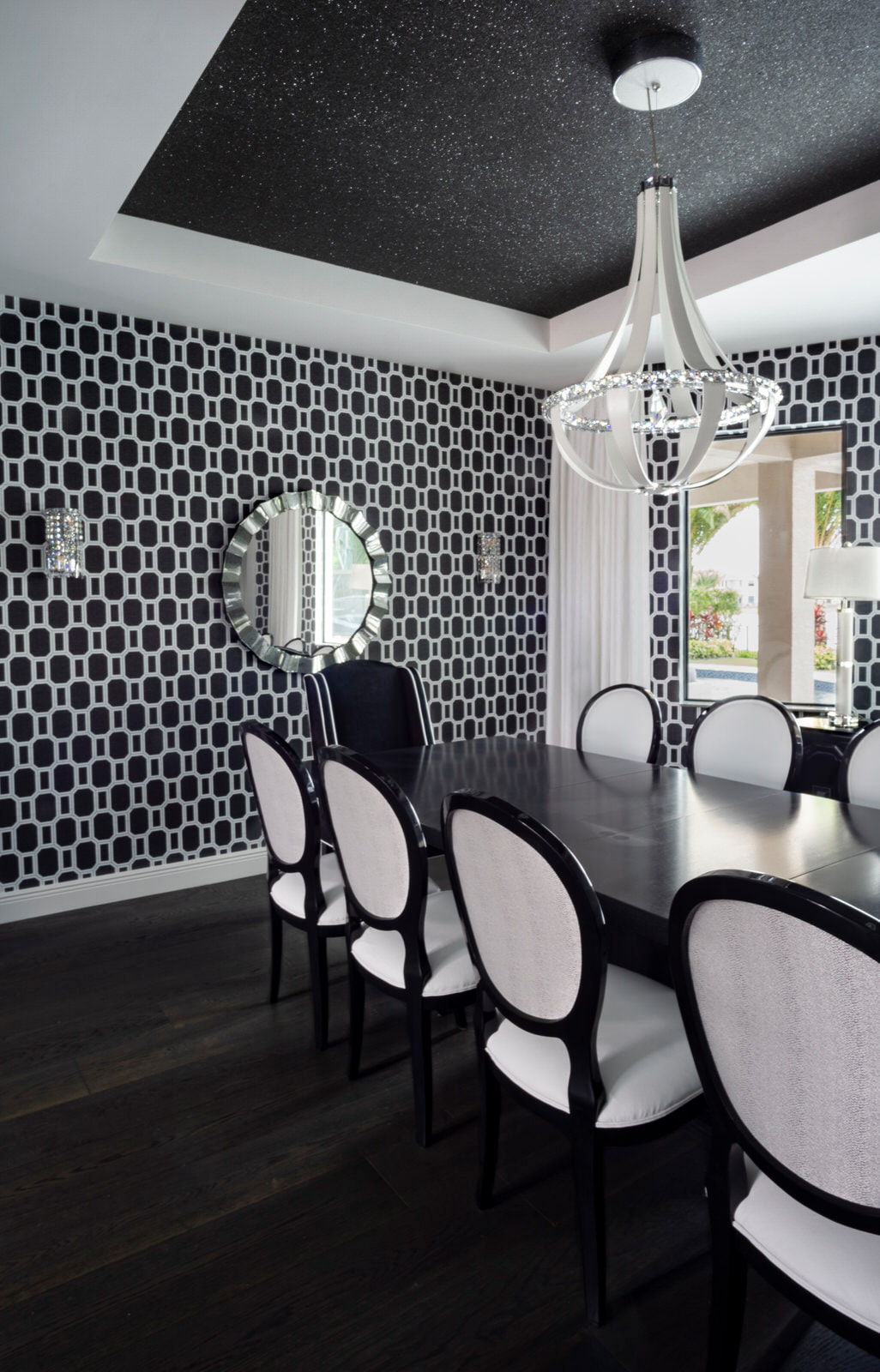 patterend black wallpaper dining space