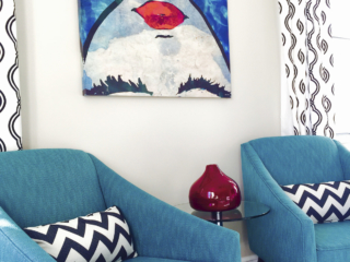 pop of blue livingroom with red accents