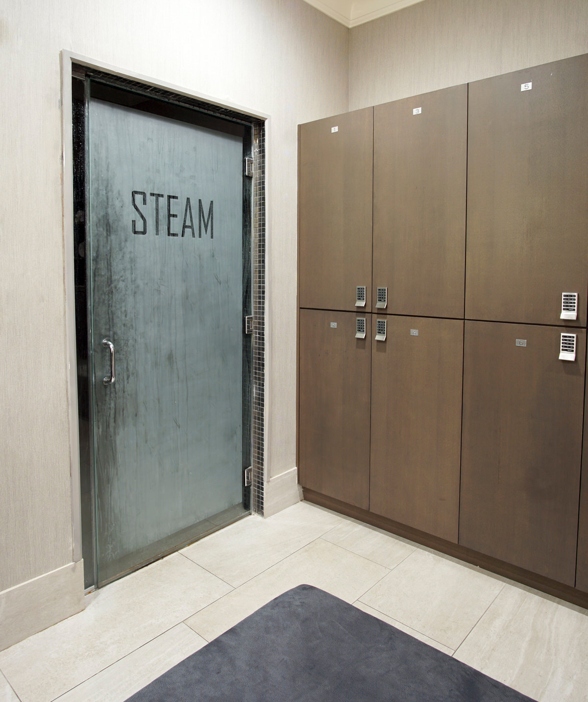 steamed shower doors commercial bathroom
