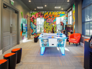 teens gaming room with graffiti walls