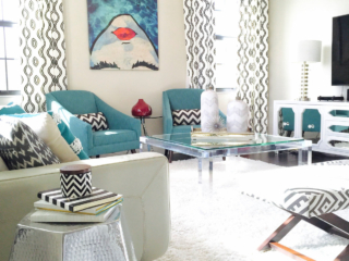 white living space with pops of black chevron and blue and red colors